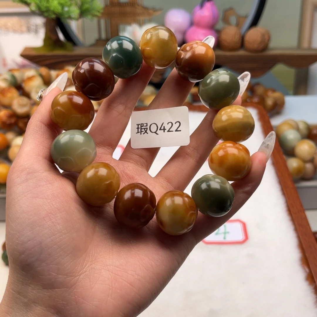 菩提根/象牙果手串?***通20mm瑕柿子一串q422