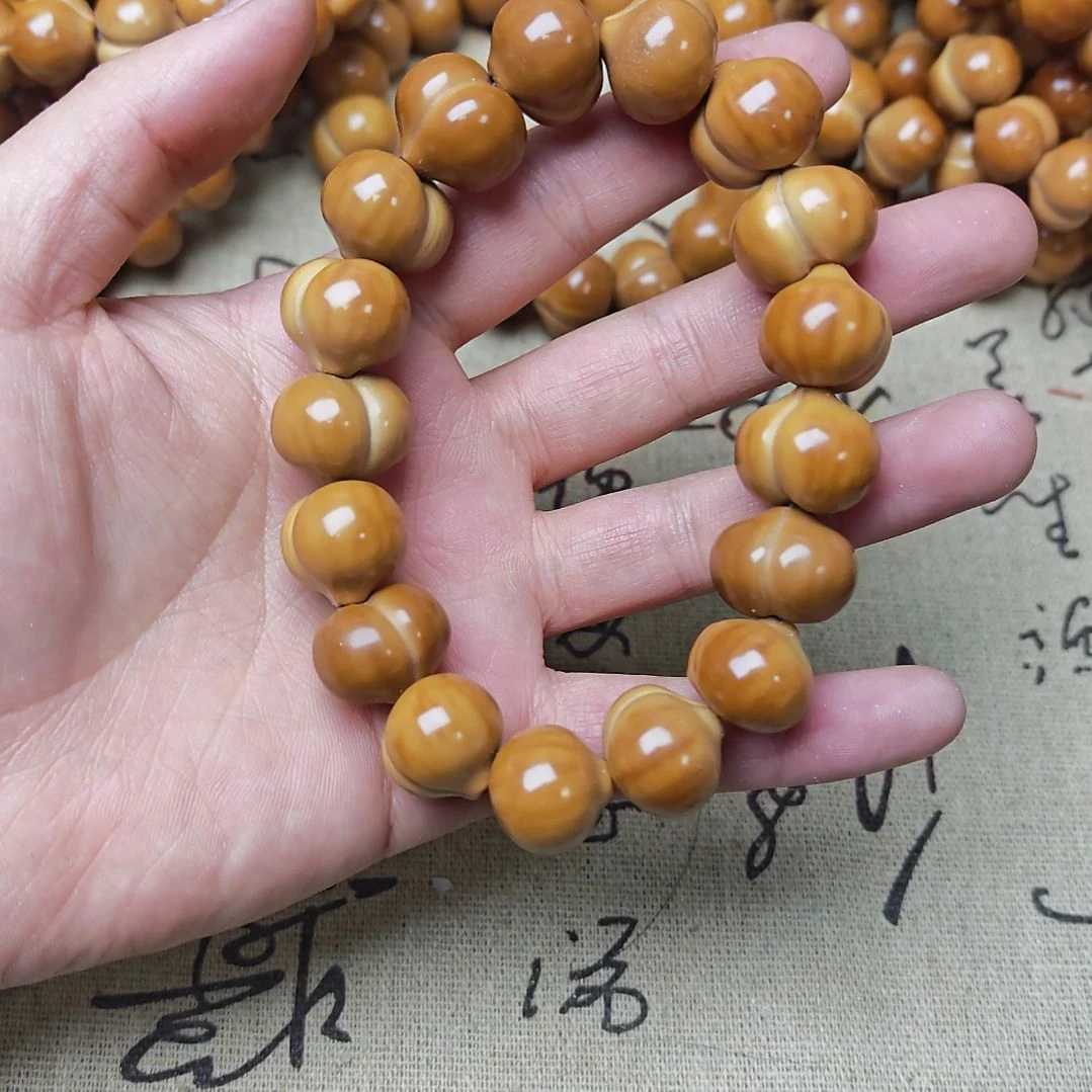 吊坠猴头核桃屁桃手串瑕款