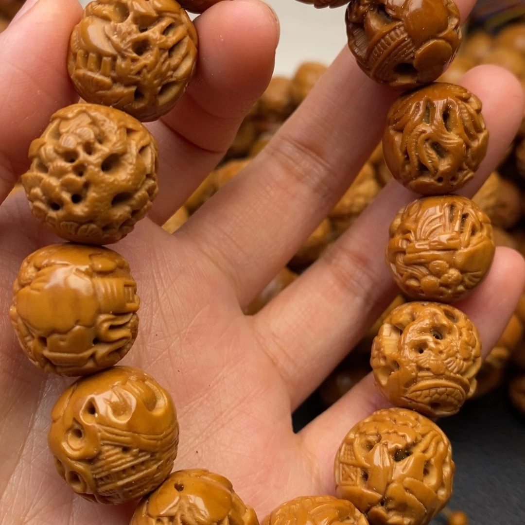 橄榄核手串镂空山水