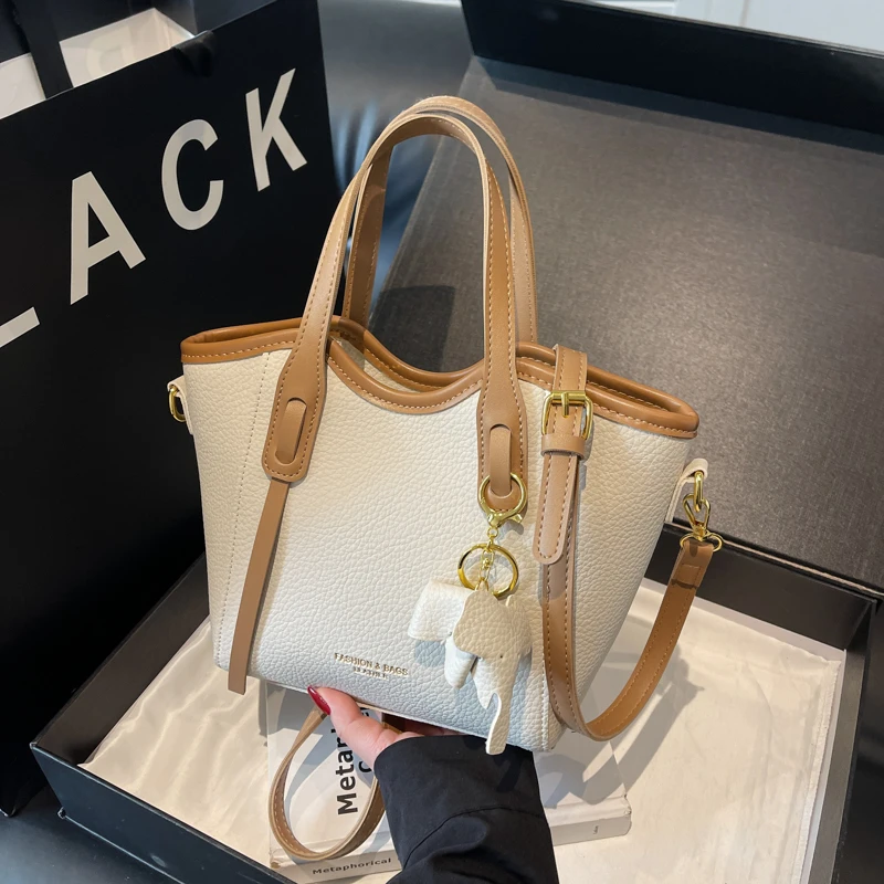 2025春夏新款时尚手提包简约百搭斜挎包小众洋气女士水桶小包包