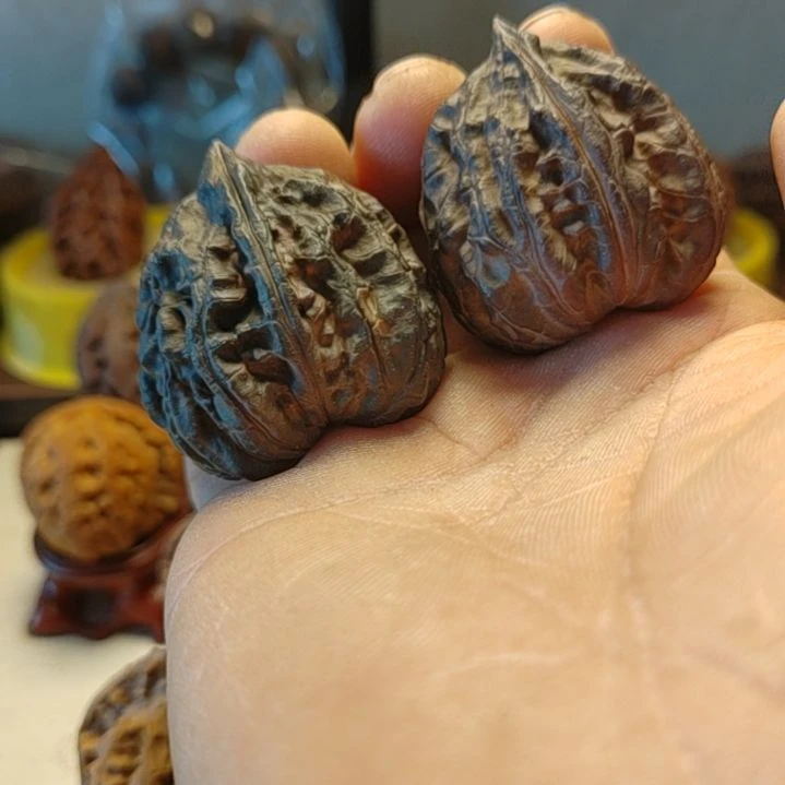 桥***枪把件文玩核桃龙鳞甲残品