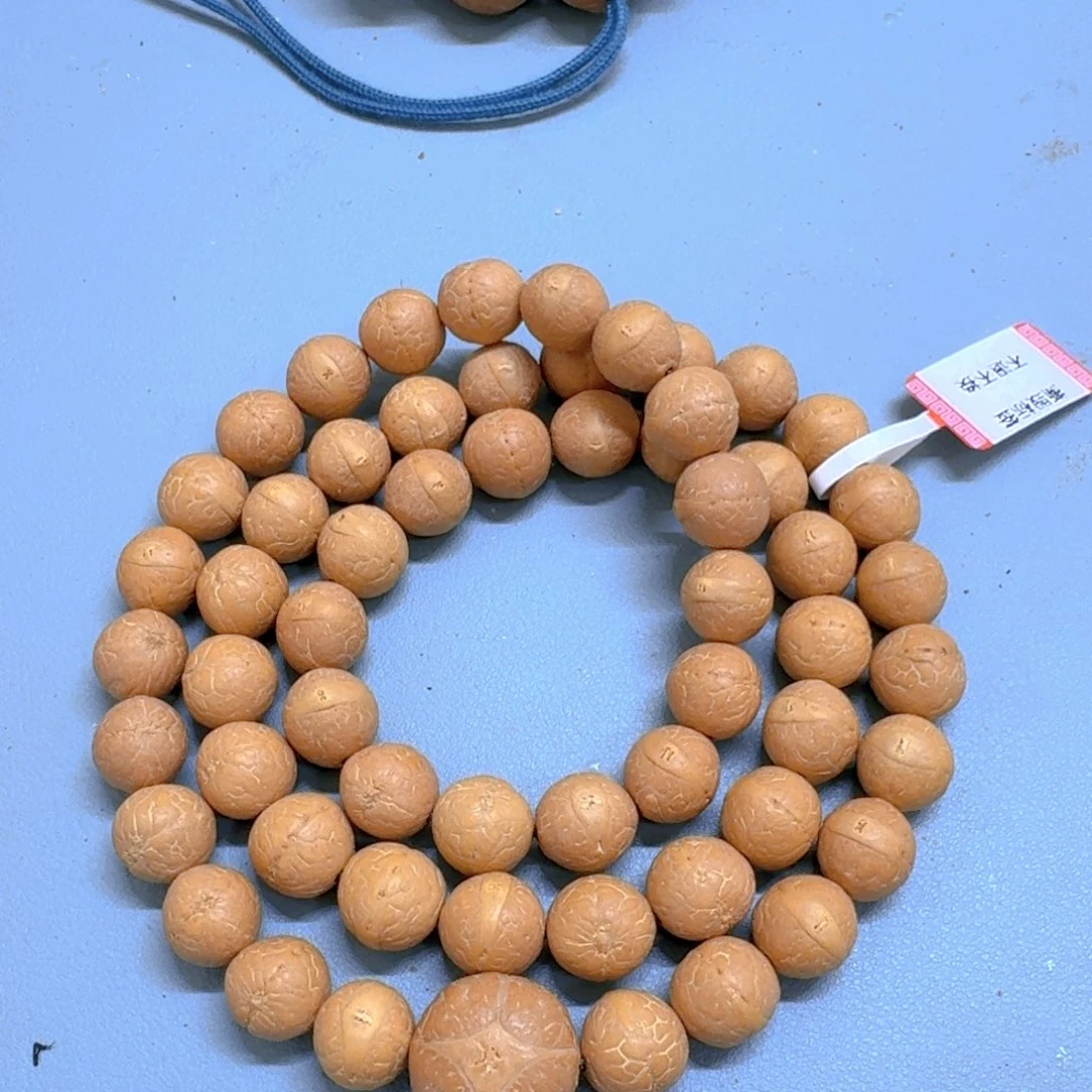 凤眼菩提把件11mm手持58颗86@B110136