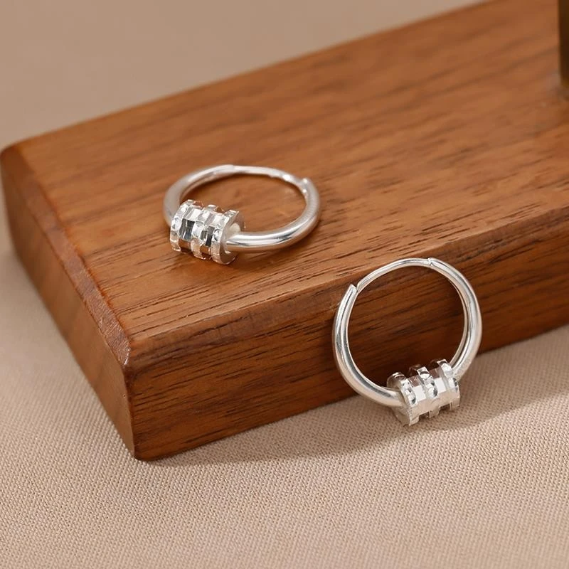 足银耳饰999纯银小蛮腰耳圈女生足银轻奢风小众耳钉日常夏天通勤