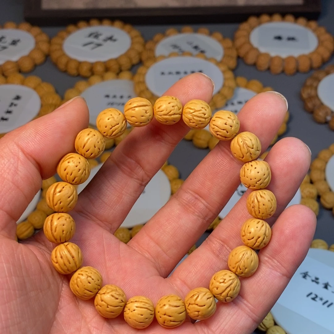 旭***_吊坠桃核精品桃核手串铁核