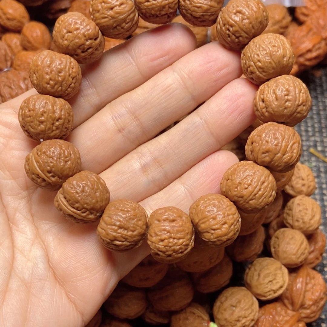 美***光桃核吊坠小磨盘手串