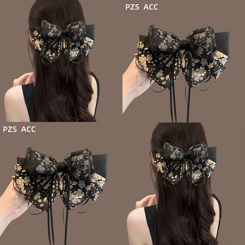 复古丝带蝴蝶结弹簧夹女2025新款高级感半扎发发夹后脑勺盘发发饰