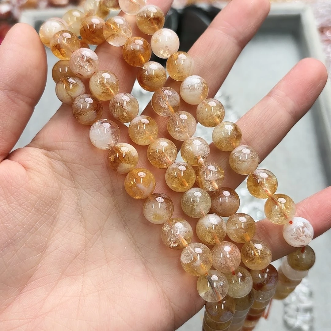 玛瑙/玉髓未镶嵌珠宝半成品卡十黄塔晶圆珠一条