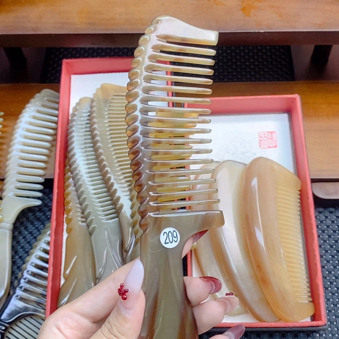 纯手工制作纯牛角梳子X**霞
