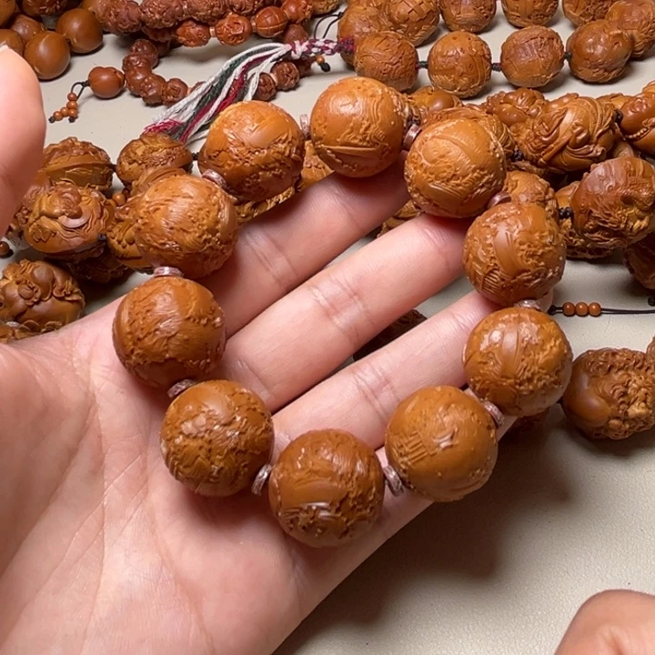 橘***妹橄榄核手串锦绣山河