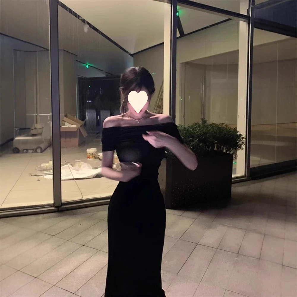 高冷御姐穿搭黑色一字领连衣裙女夏季气质修身显瘦掐腰包臀长裙子