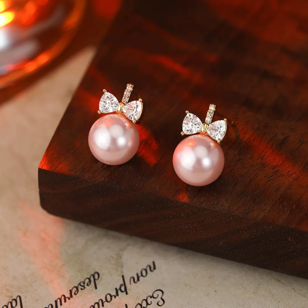 铜合金仿珍珠耳饰 ES-322法式轻奢蝴蝶结粉色珍珠时尚清新耳钉