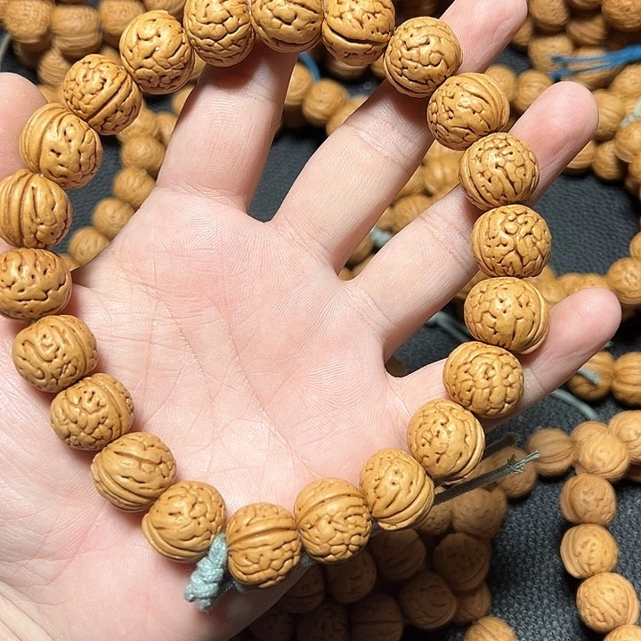 吊坠桃核谨**沸桃核