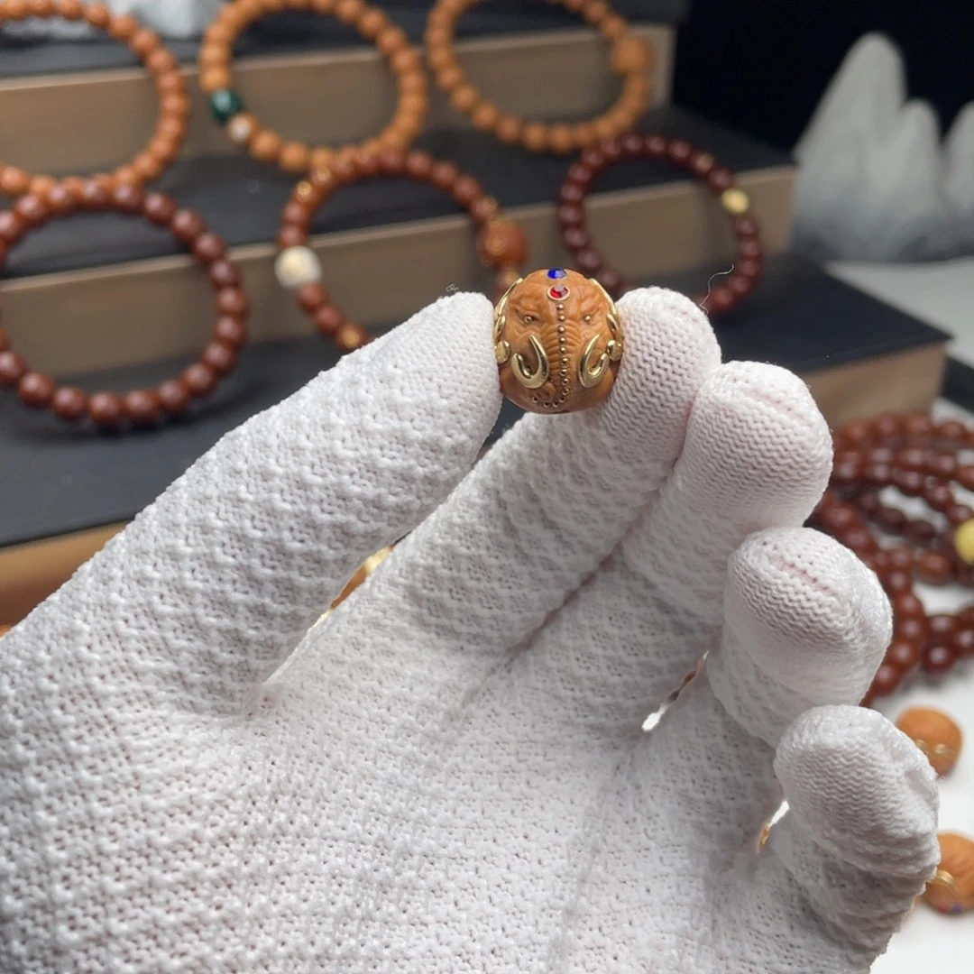 骂***人猴头核桃吊坠象神镶嵌