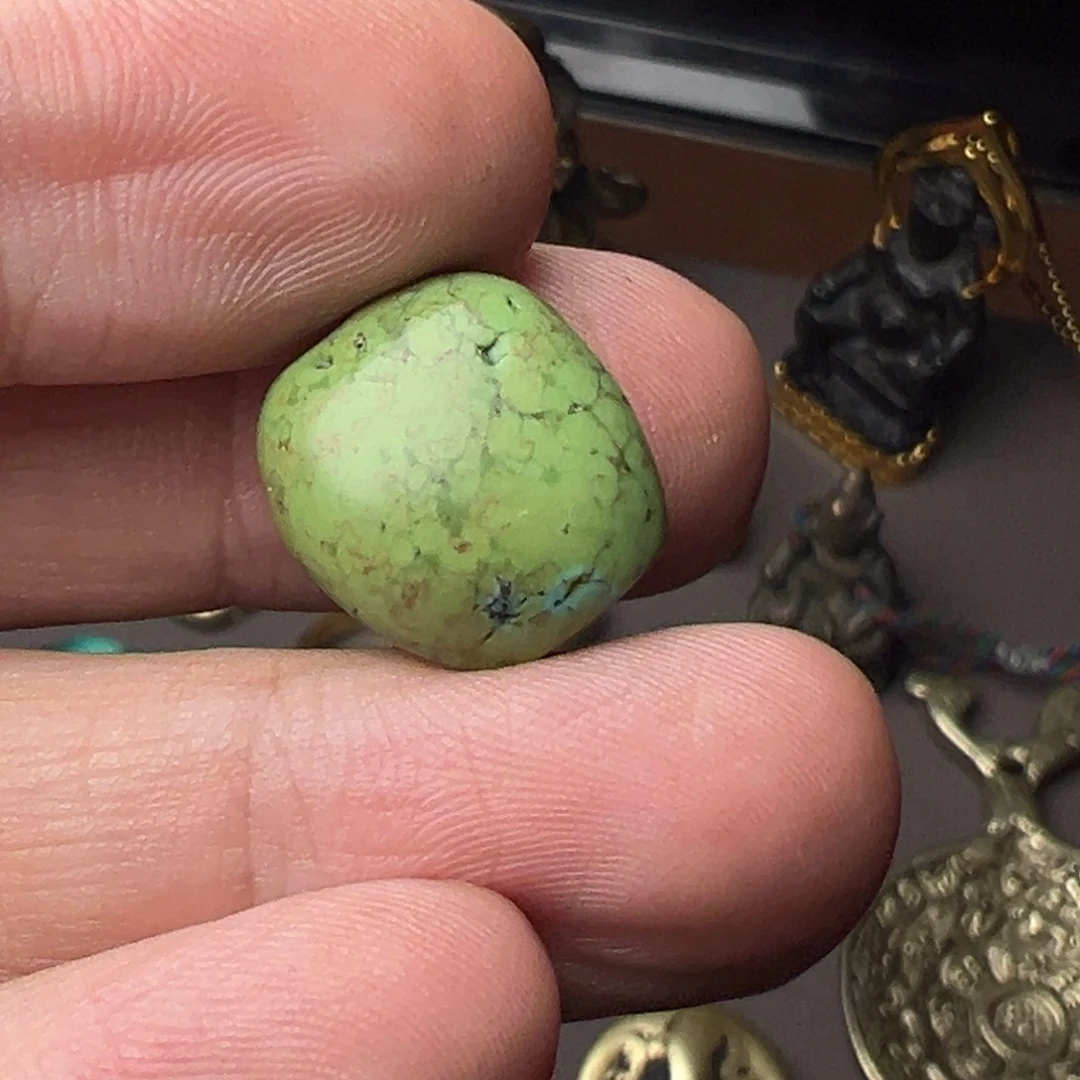 吊坠松344578估计