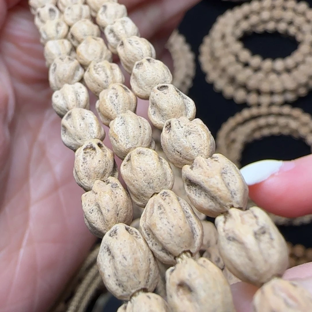 柏香籽/百香籽吊坠巴**年