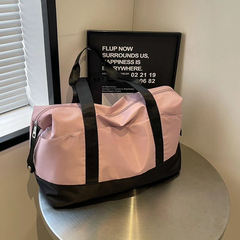 大容量手提短途旅行包女士可折叠学生拉杆行李包男登机待产收纳袋