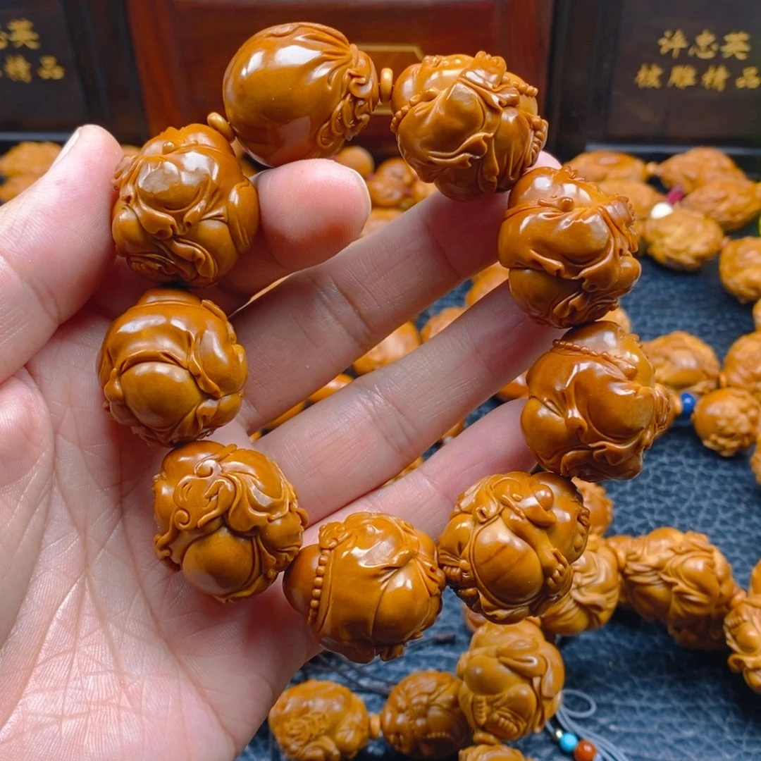 橄榄核手串/手链粉***了许忠英2.5富态八宝米勒