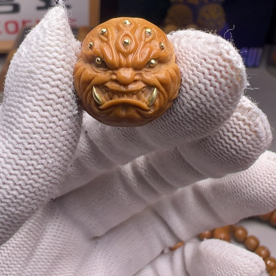 文玩核桃把件镶嵌款九目獠牙18左右尺寸全品有正常封口线