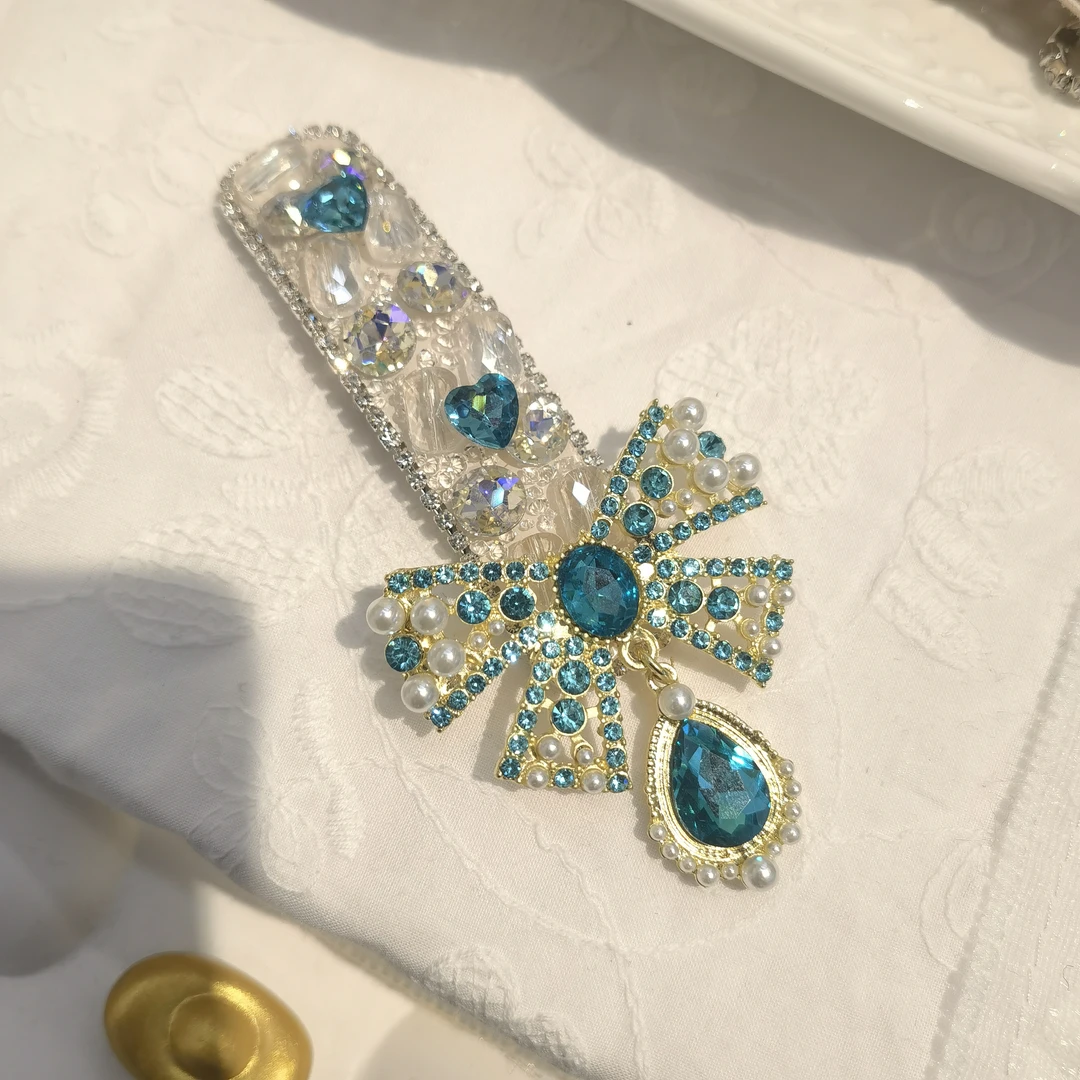 E334蓝色蝴蝶结流苏闪闪掰掰夹