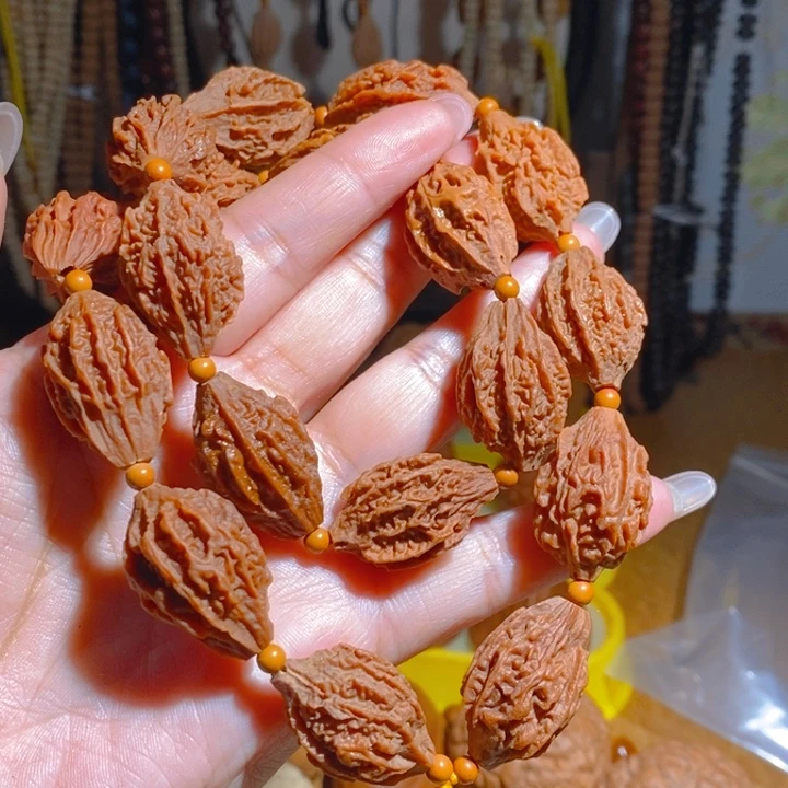 野生麒麟眼橄榄核手持18颗