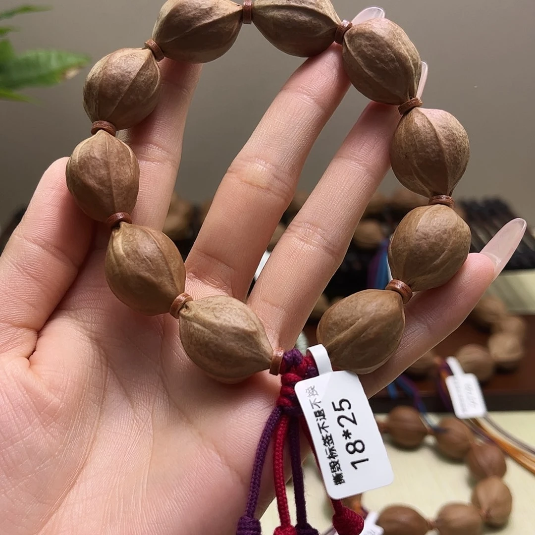 自***息橄榄核吊坠梅林铁核文玩手串