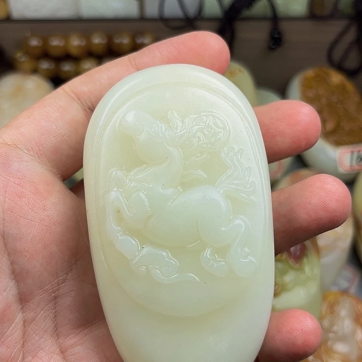 哇***哈石材方解石手把件马