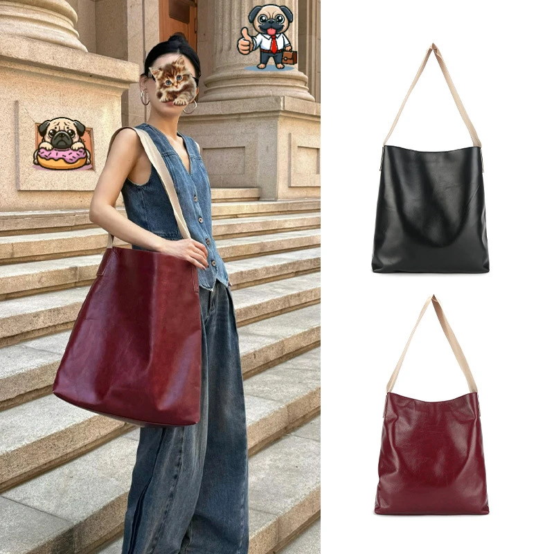 时尚简约大容量托特包包女2025新款小众设计师宽肩带斜挎通勤包