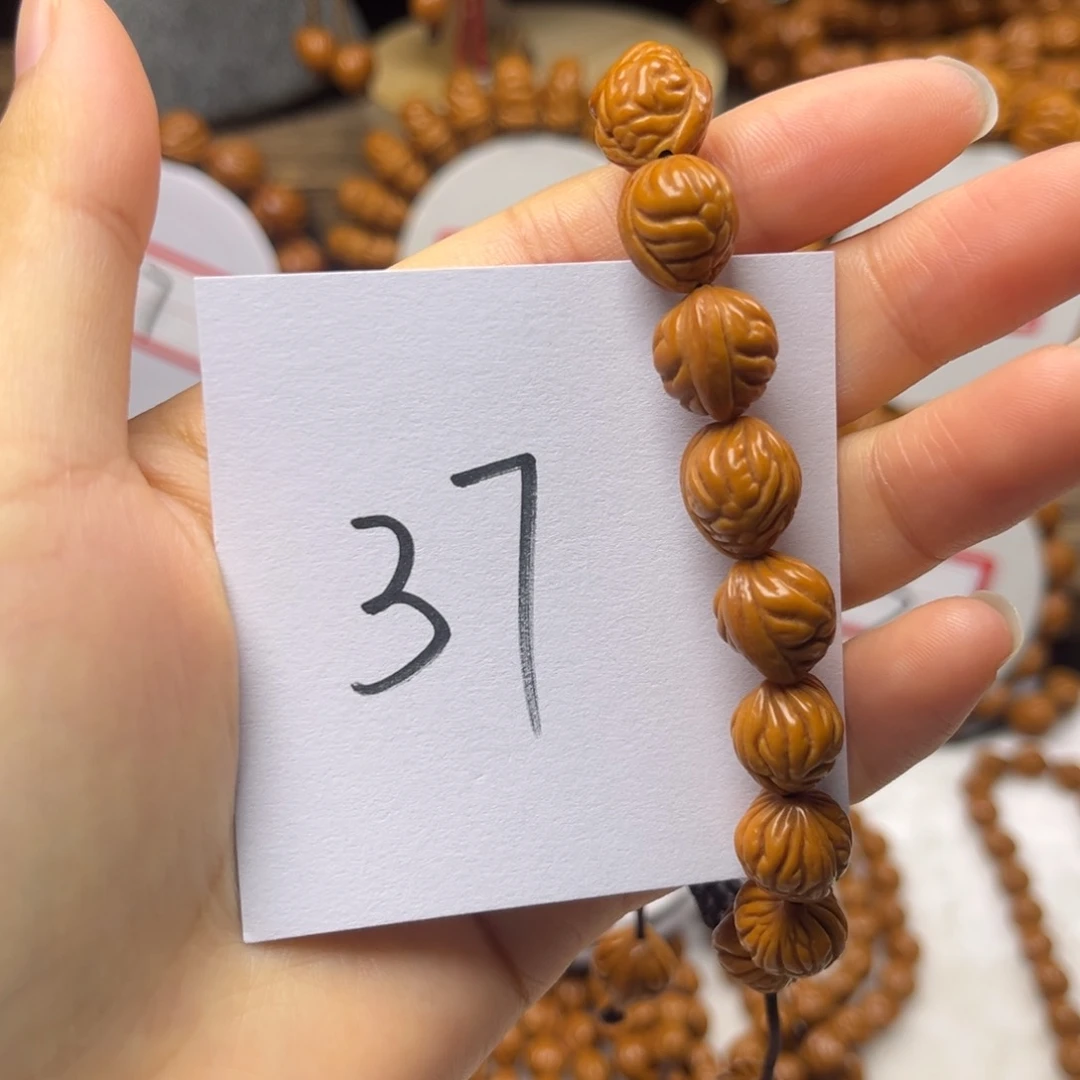 吊坠桃核龙纹桃核手持肚卡11小金豆