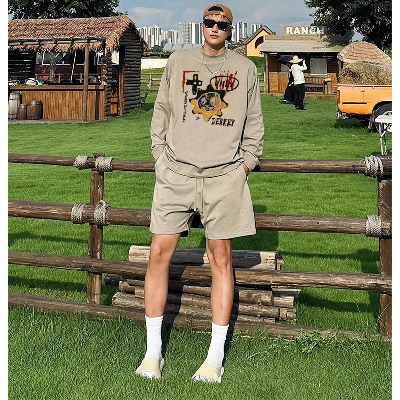 美式ins创意涂鸦太阳字母印花长袖T恤男秋季宽松休闲纯棉情侣上衣