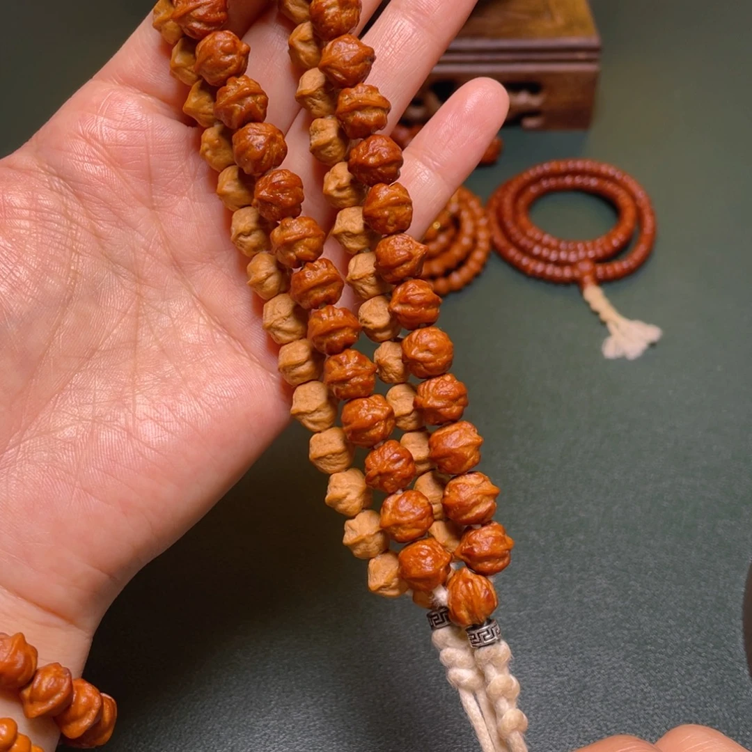 柏香籽/百香籽吊坠白牙横打手持