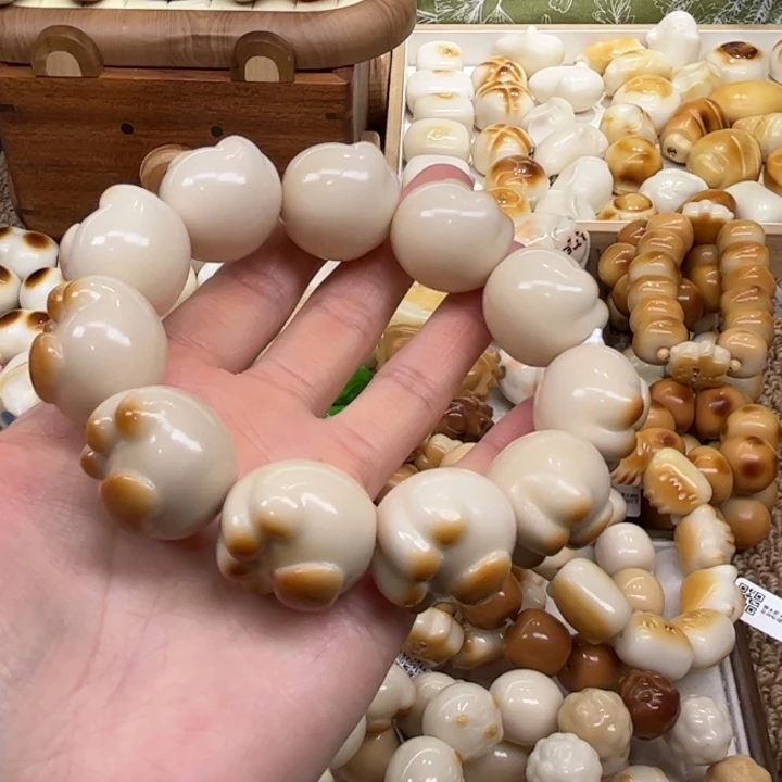 菩提根/象牙果把件12.14.35象牙果炭烤爱心猫爪瑕