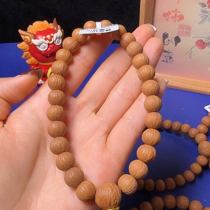 阿***弟手串猴头核桃凤羽