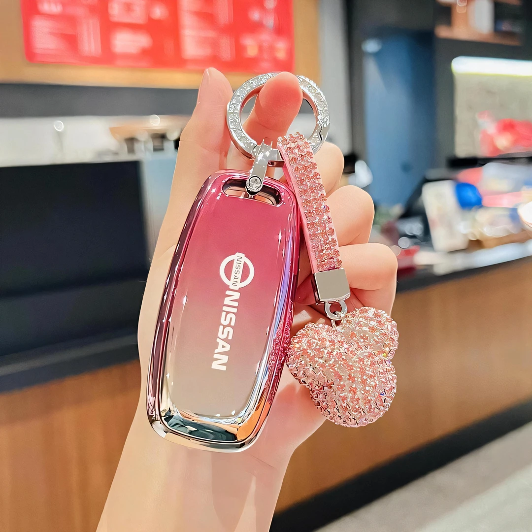 适用日产奇骏钥匙套epower尼桑专用超混新款男士女士可爱高档扣包