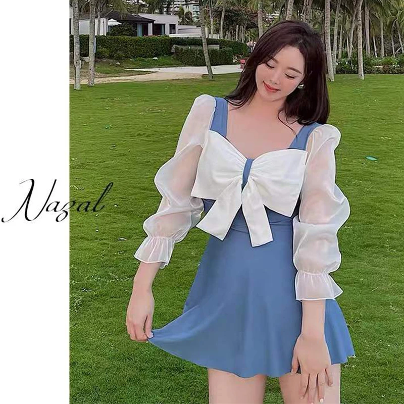 大码泳衣女连体长袖保守胖MM纯欲少女可爱结温泉泳装遮肉遮肚