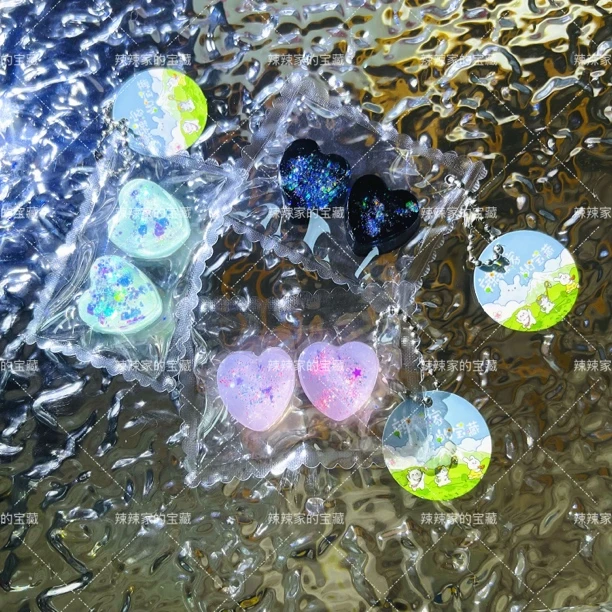 小鼻嘎迷你爱心透明闪亮片捏捏硅胶解压可当包挂星星