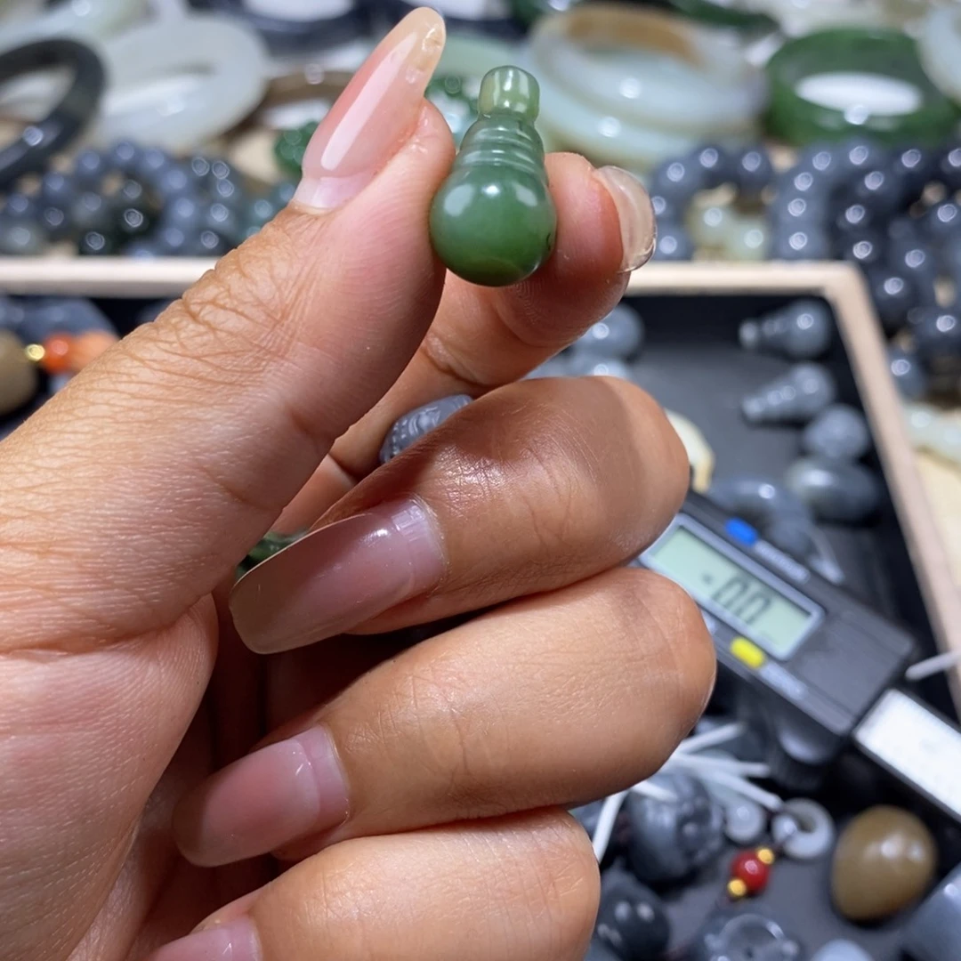 和田玉未镶嵌挂件风****店