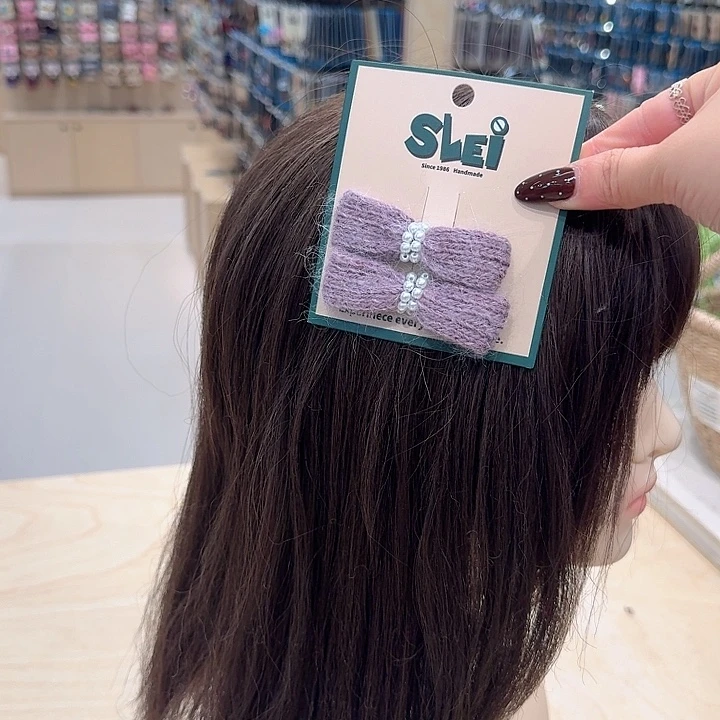 紫色蝴蝶结珍珠鸭夹