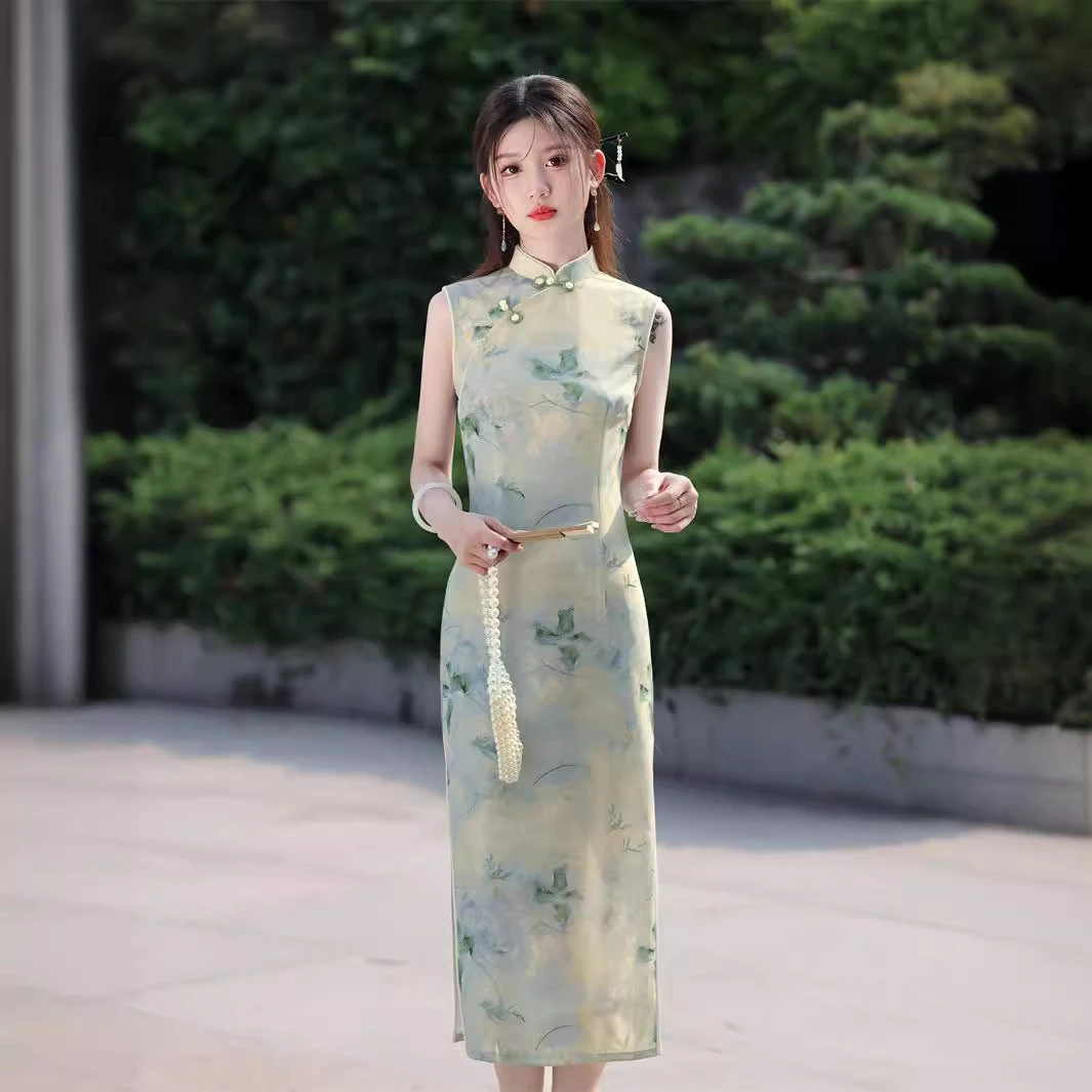 SJT 2025夏季新款网纱印花无袖长款旗袍改良版连衣裙绿色国风修身