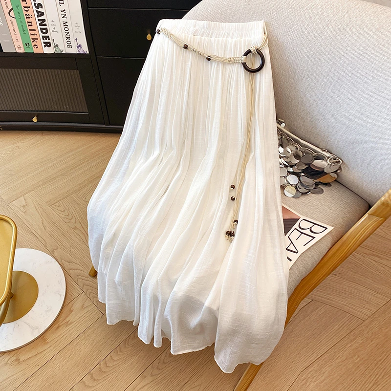 法式白色百褶半身裙秋冬2025新款波西米亚风高腰垂感棉麻a字伞裙