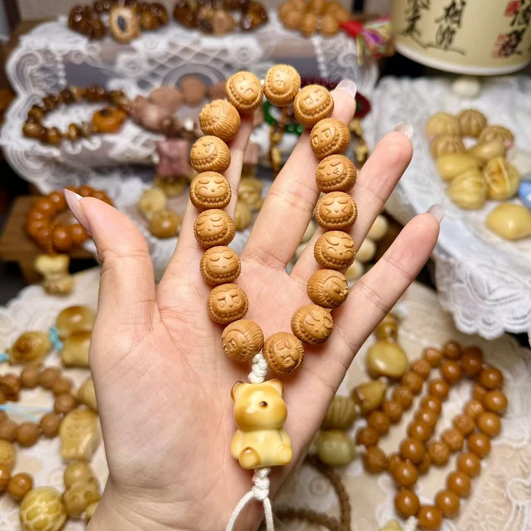 布布手持猴头核桃万目高抛全品无暇-象牙果小熊