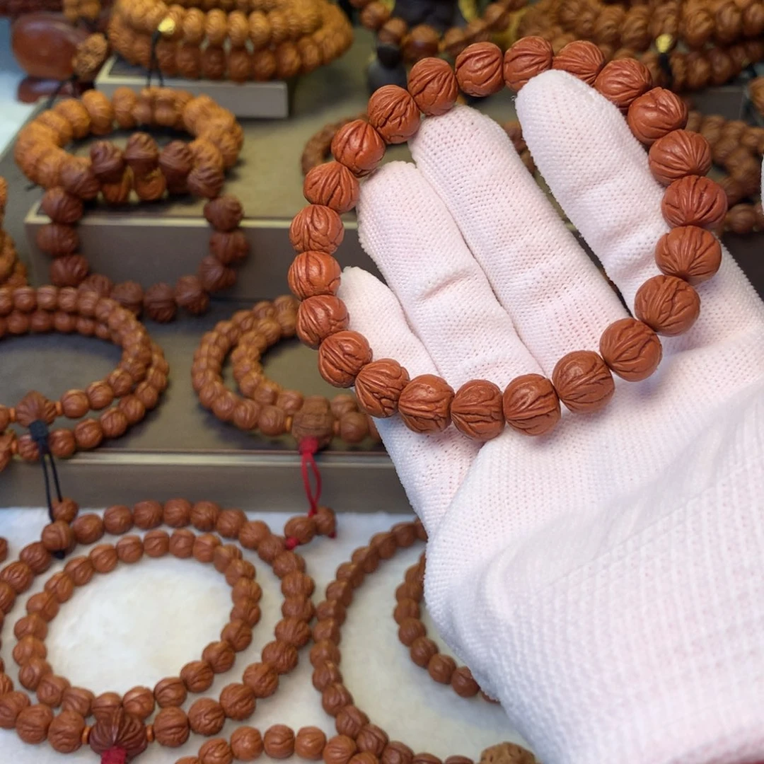 泓***笑桃核手串秦岭龙纹