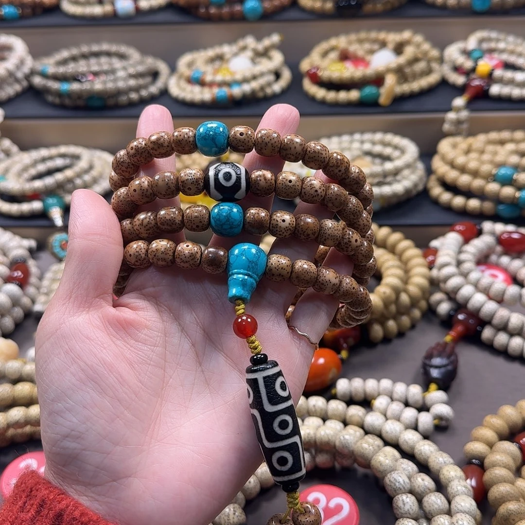 劳***山星月菩提吊坠海南星月菩提原生态