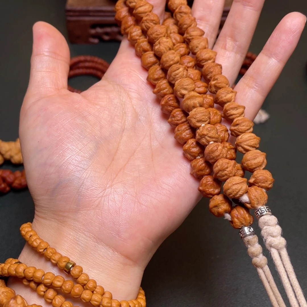 柏香籽/百香籽吊坠白牙横打手持