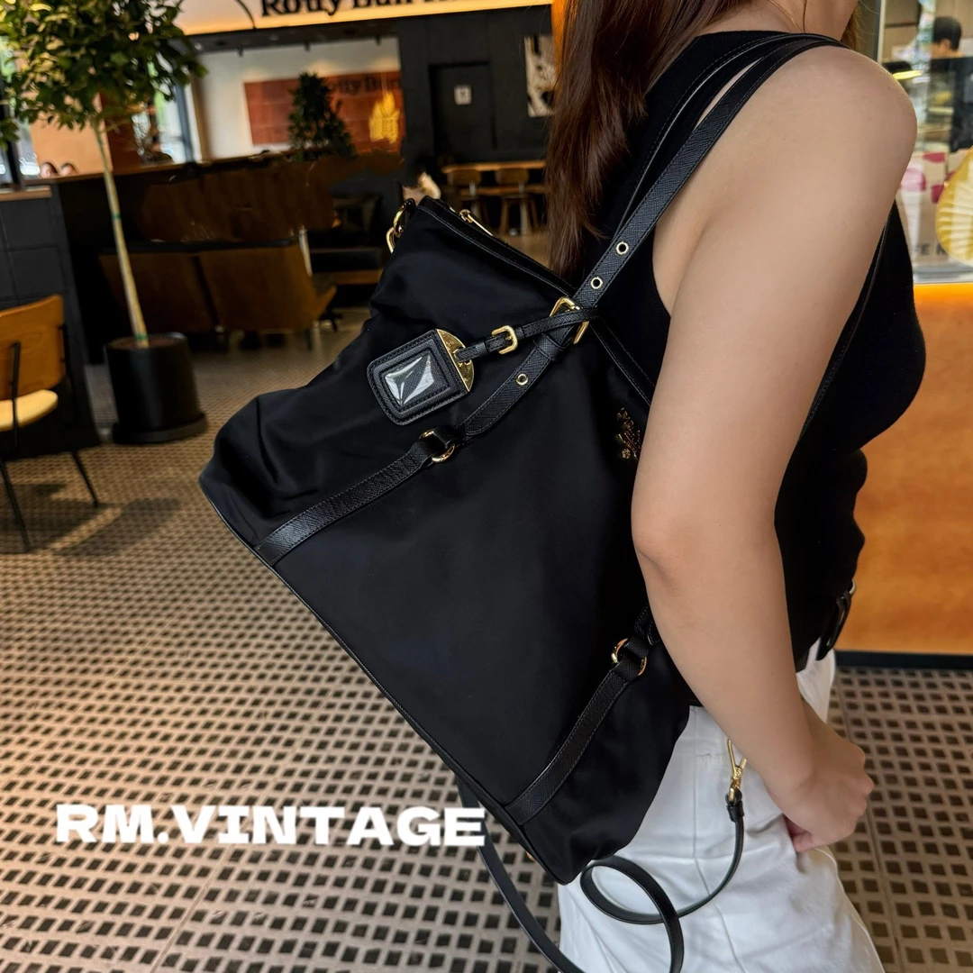 95新 Prada/普拉达 入目 新款黑金饺子包(身份卡 肩带）47835