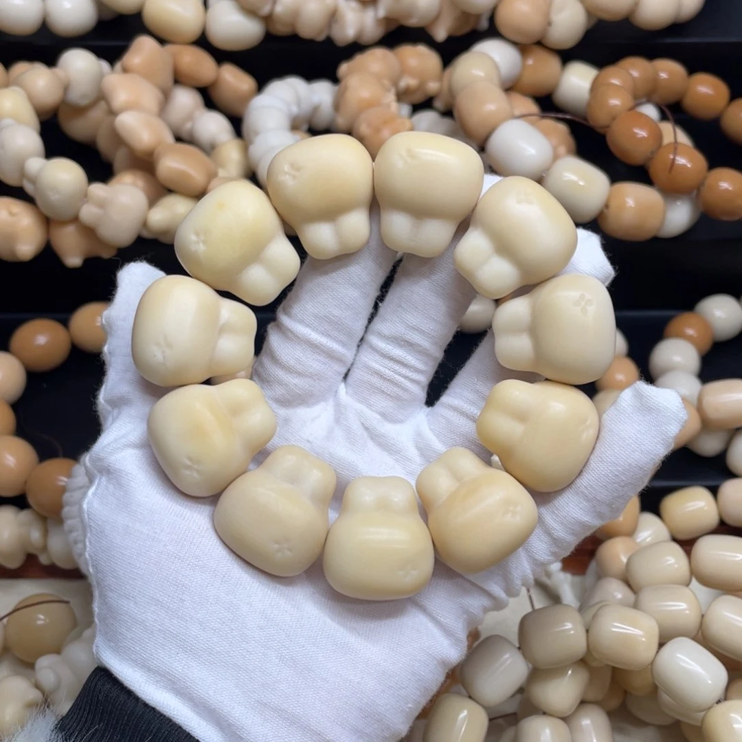 菩提根/象牙果吊坠27干磨瑕疵牙果兔头027