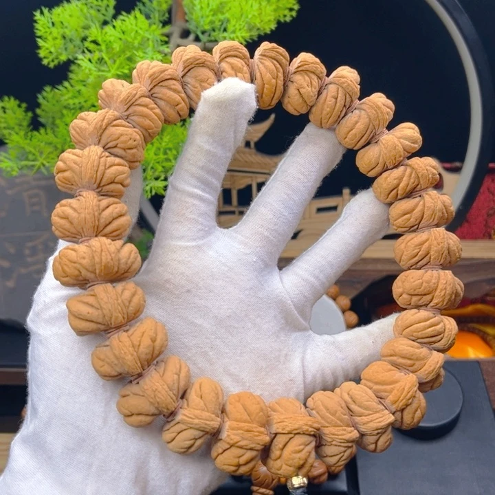 桃核吊坠妈**呀野生桃核手持大尺寸