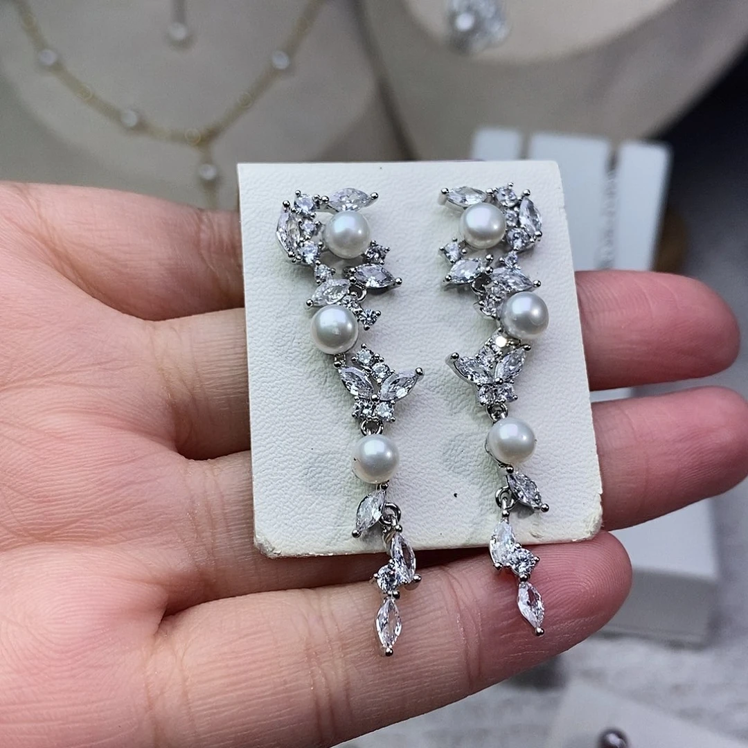 淡水珍珠银S925镶嵌耳饰