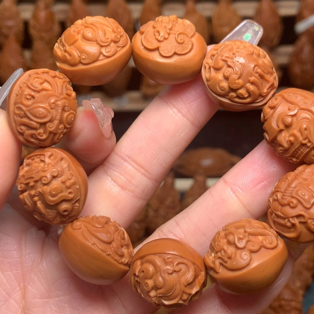 把件橄榄核兽面手串