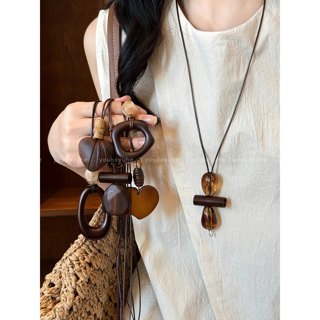 非金属皮质项链 新中式镂空水滴长款项链女高级感轻奢复古毛衣链