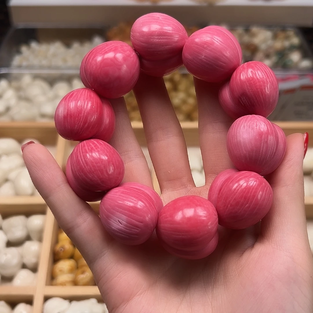 菩提根/象牙果手串瑕疵粉拉丝屁桃一串有裂面